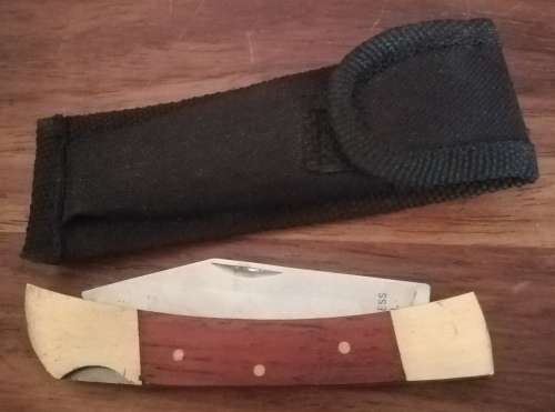 Fold up Pocket knife in pouch stainless steel blade.
