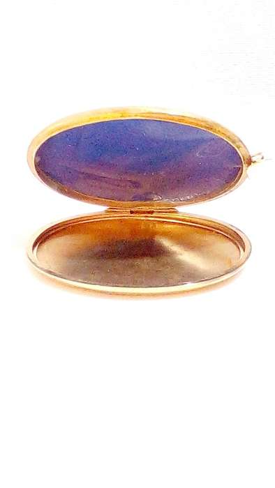 Vintage 9ct gold locket on metal core