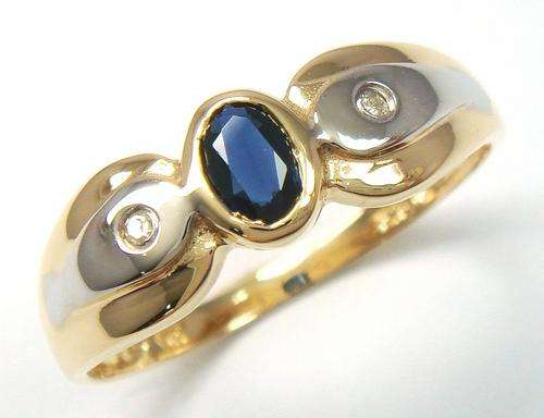 Beautiful solid 9kt gold and genuine sapphire and diamond ring.