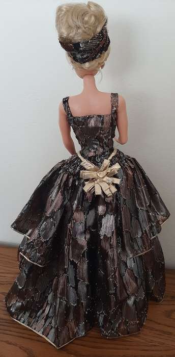 Shiny black patch flounced dress on 47cm doll