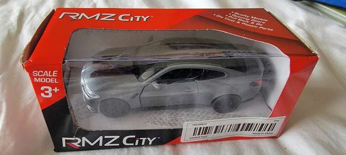 Silver BMW M4 Limited Edition Die-Cast Metal Model Car, with functioning opening doors!