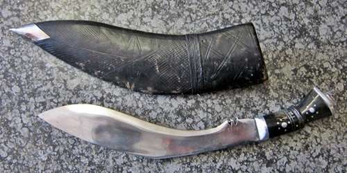 ## Kukri Gurkha +/- 220mm long Blade in Sheath ##