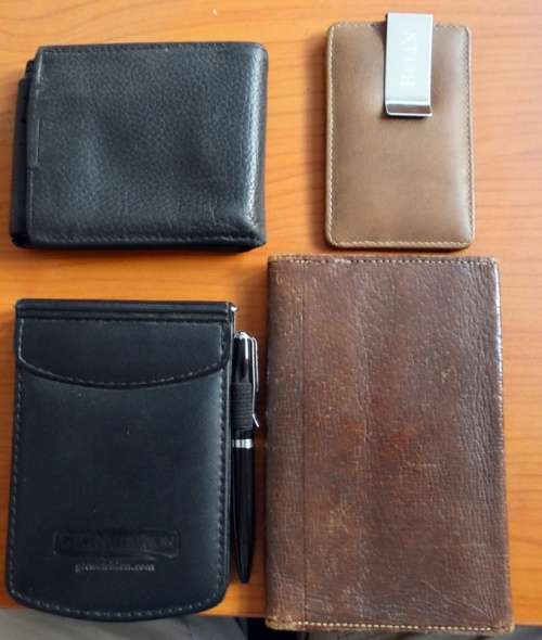 Genuine leather wallets and note pads with pen