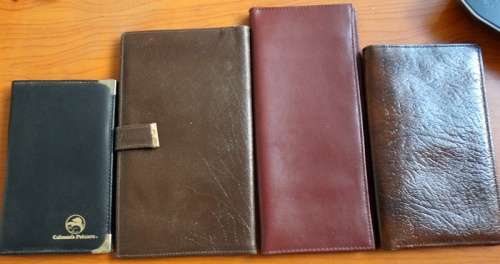 Genuine leather wallets and note pads with pen Checkbook holders