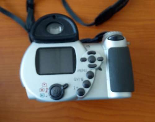 Konica Minolta Camera Working. Needs 4 AA Batteries.