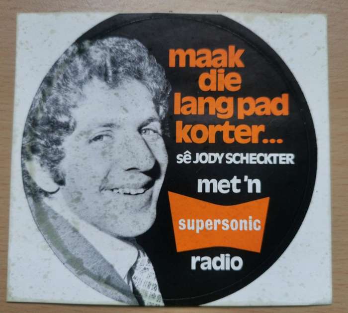 Pair of rare 1974 Afrikaans Jody Scheckter car license disk stickers advertising Supersonic Radios