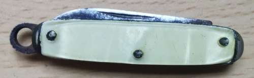 Vintage USA-made mini pocket knife with end ring