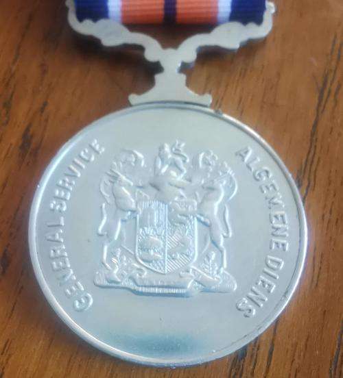 Full-size General Service medal with ribbon - numbered on rim