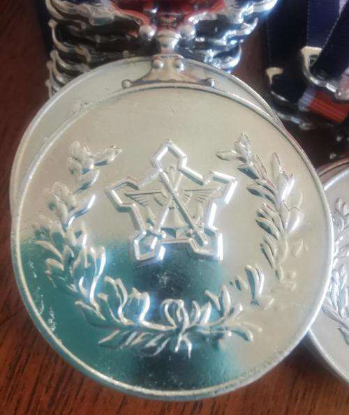 Full-size General Service medal with ribbon - numbered on rim