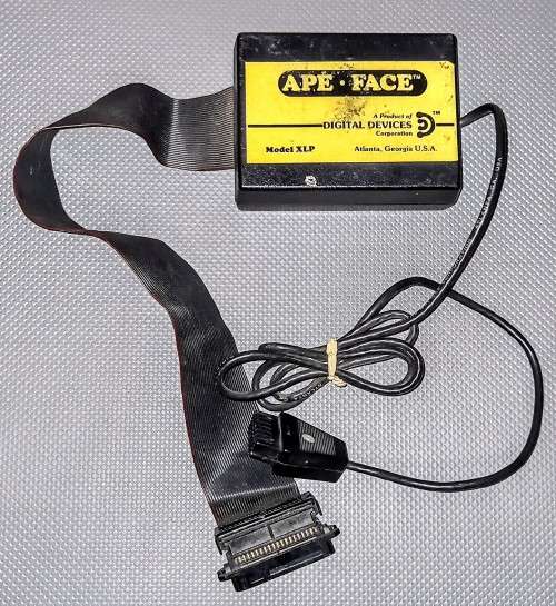 Atari 800 XL Computer and Atari 1050 Floppy Disk Drive with Power Supplies and Cables