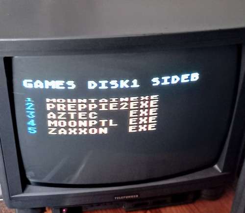 Atari 800 XL Computer and Atari 1050 Floppy Disk Drive with Power Supplies and Cables