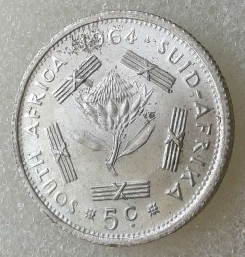 Encapsulated 1964 Republic silver 5c in AU