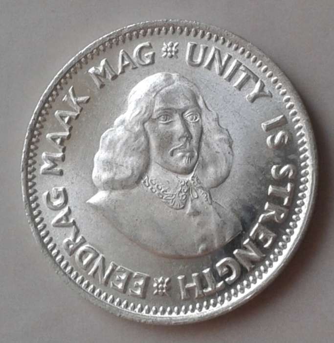 1961 Republic silver 2 1/2c in lustrous uncirculated.