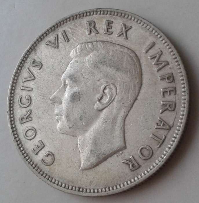 1945 Union silver 2 1/2 Shillings in VF+ with big die crack