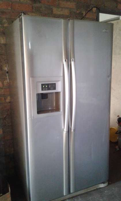 LG double door fridge with ice maker, crusher and water dispenser