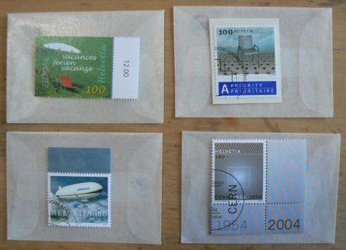 Switzerland 2004 lot of 31 officially cancelled stamps + blocks & sheets + 24 FDCs + 7 cards