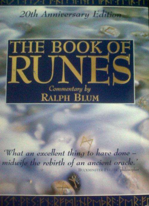 The book of Runes with full set of Rune stones