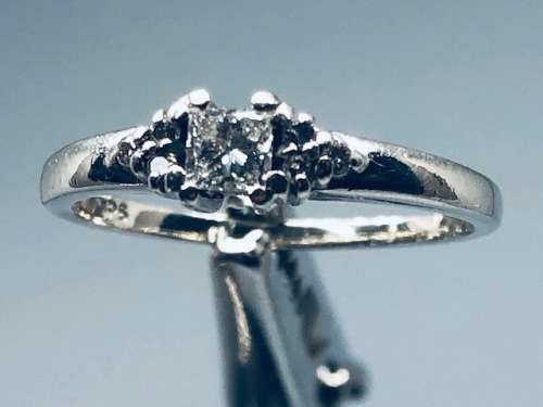 9K White Gold Diamond Ring.