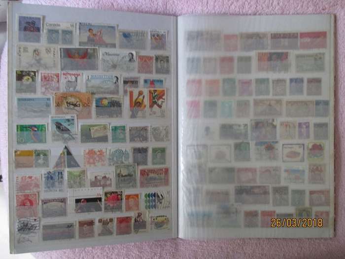 CLEAN A4 STOCKBOOK FULL OF MIXED WORLD STAMPS