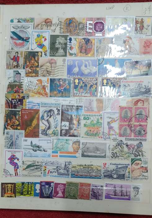 USED A4 STOCKBOOK FULL OF MIXED WORLDS STAMPS 12/24 PAGES