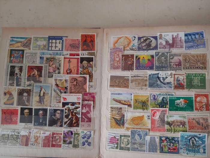 A5 STOCKBOOK LOADED WITH WORLD STAMPS GOOD VALUE