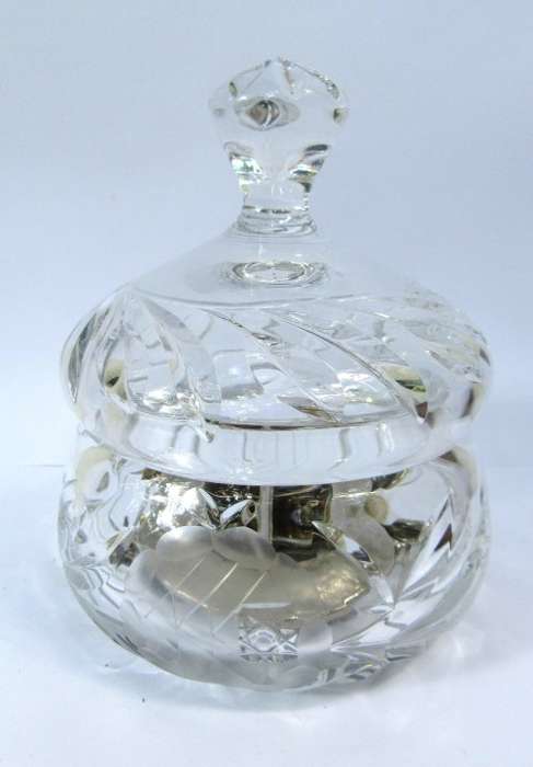 crystal lidded container in perfect damage free condition, assorted items of interest inside