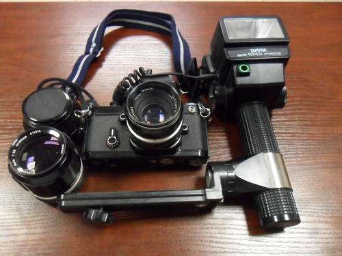 1976. 35mm  camera. F2 Photomic +105mm lens+sunpak auto4205 G thyristor flash.