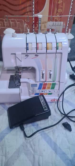 ELNA  SWISS DESIGN 4 THREAD OVERLOCKER(EXCELLENT WORKING CONDITION)