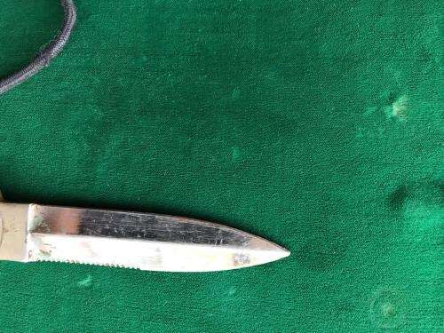 RECCE USED STAINLESS STEEL DAGGER WITH SOME RECCE CAMO TYPE STILL ATTACHED TO IT-TOTAL LENGTH 21.5CM