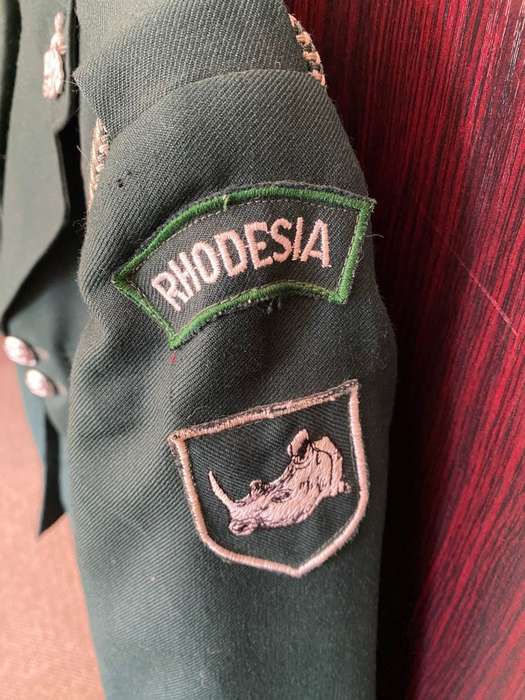 RHODESIAN GREENS,COMPLETE WITH TROUSERS,SAM BROWN AND PARADE RLI GLOVES-IT BELONGED TO DES JORDAAN-