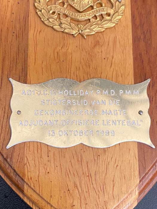 A PLAQUE TO AO1 J.C.C. HOLLIDAY P.M.D. P.M.M.
