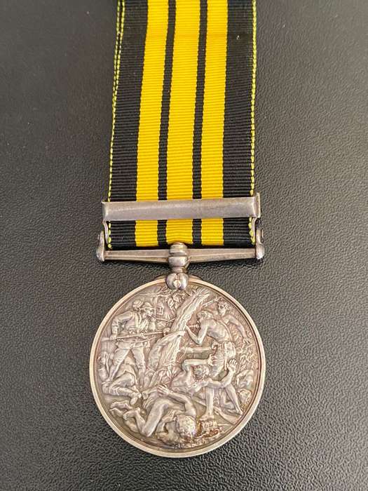 FULL SIZE (SILVER) EAST AND WEST AFRICA MEDAL WITH 1897-98 CLASP-AWARDED TO 675 PTR. SUANU AF01 LAGO