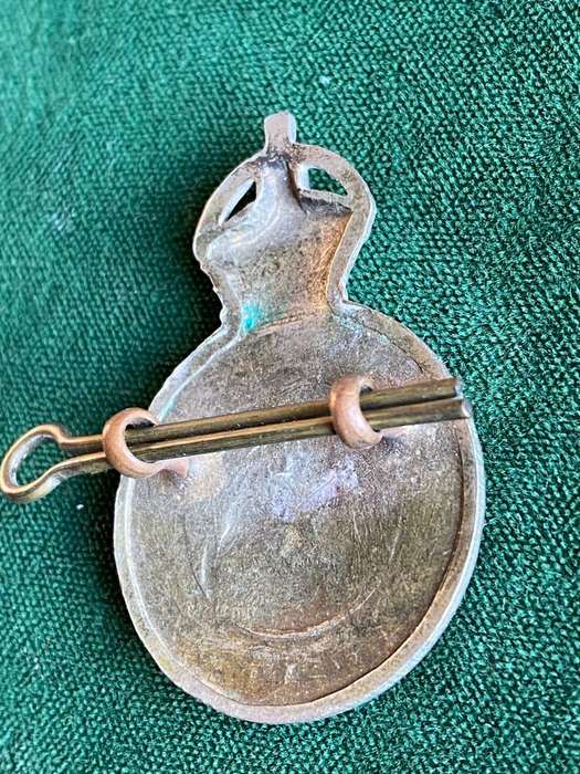 SA CONSTABULARY,WHITE METAL HELMET AND CAP BADGE-SOLID CENTRE-2 LUGS-MEASURES 43X39M
