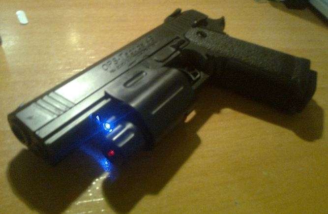 OPS Tactical 45 cal Spring Airsoft Pistol BB Gun With Laser and Flashlight