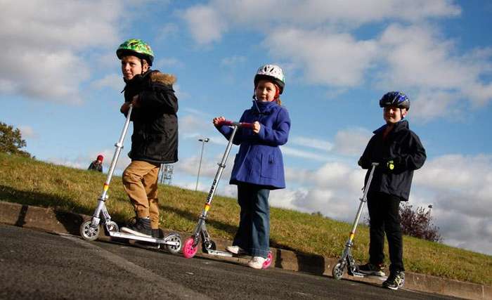 Three Wheel Adjustable Height Metal Folding Skate Scooter with Led Lights and Bell in Blue or Pink