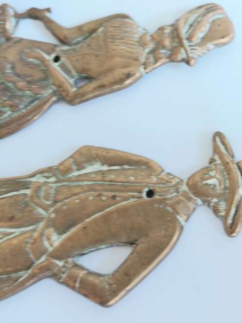 Gorgeous!! Large his and hers brass coat hangers Wow!!
