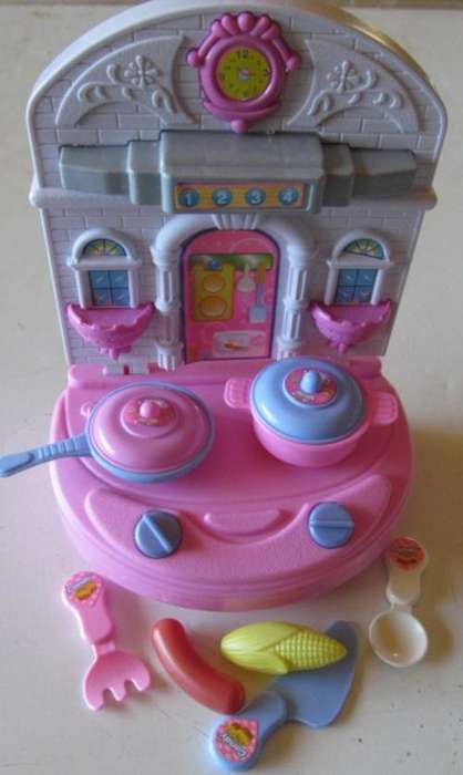 Cute Little stand up kitchen with accessories perfect for Barbie Dolls