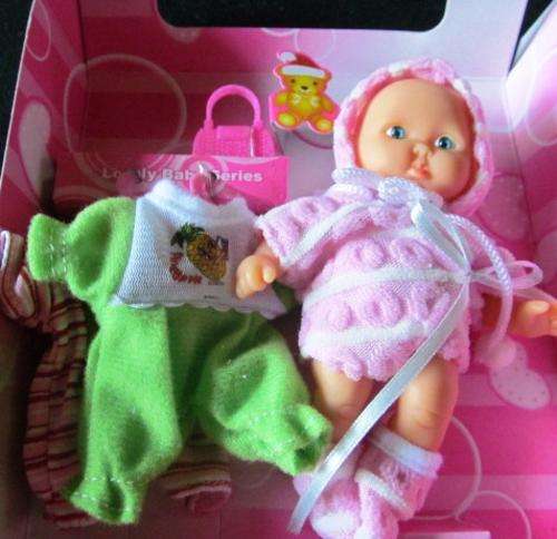 Cute Little Doll with Two extra Outfits (Flat Rate-R40 shipping no matter how many items U take)