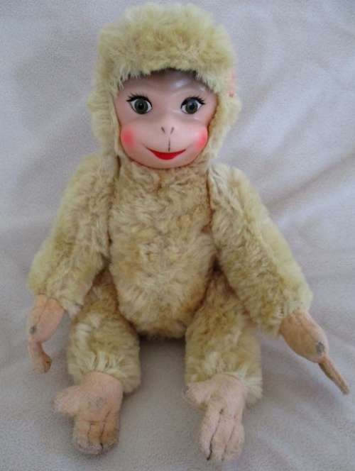 A VINTAGE FULLY JOINTED RUBBER-FACED MONKEY - DEFINITELY A FEMALE!!