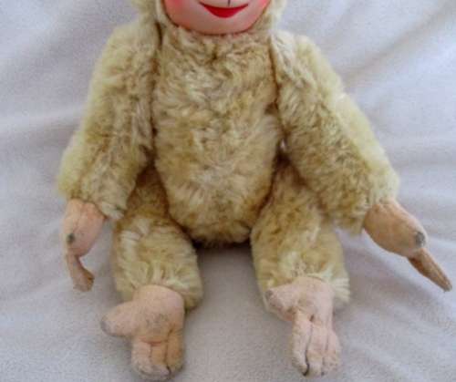 A VINTAGE FULLY JOINTED RUBBER-FACED MONKEY - DEFINITELY A FEMALE!!