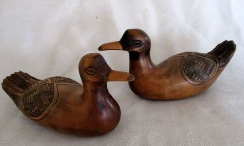 TWO DECORATIVE HAND CARVED SOLID WOODEN DUCKS