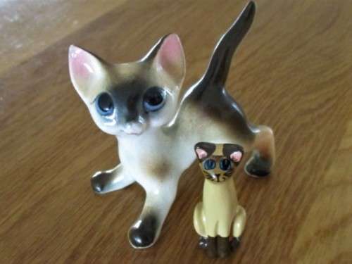 TWO SMALL COLLECTABLE CATS - MADE BY CAPRI AND FAY