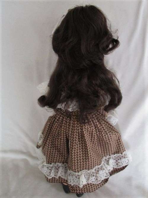 A LOVELY 49CM TALL BROWN-EYED VINTAGE DOLL