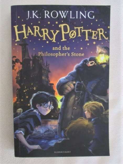 RELISTED - HARRY POTTER AND THE PHILOSOPHER'S STONE (2014 PAPERBACK)