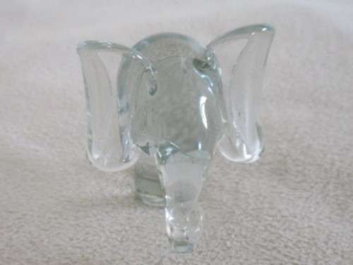 A TINY NGWENYA GLASS ELEPHANT IN PERFECT CONDITION