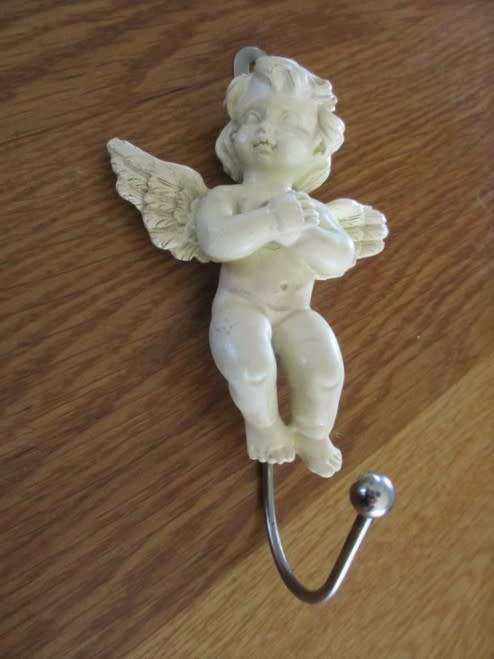 A CUTE CHERUB CLOTHES HOOK