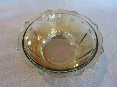 A SET OF SIX IRIDESCENT AMBER GLASS DESSERT BOWLS
