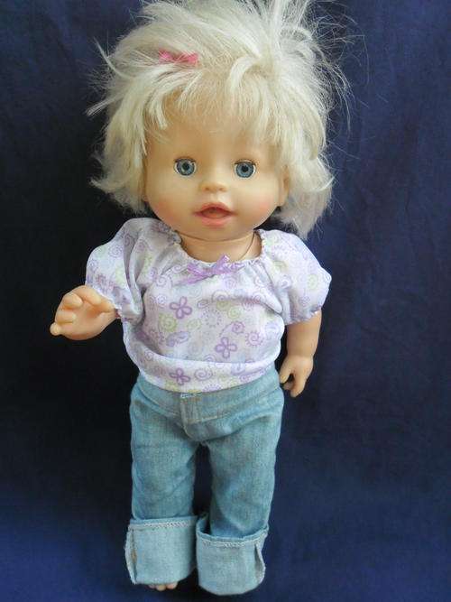 THIS NODDING,SNEEZING,WHEEZING,COUGHING,TALKING MATTEL DOLL IS CUTE BEYOND WORDS!!!