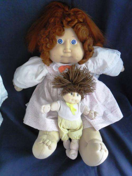 A LARGE RED HEADED CABBAGE PATCH AND HER MARTHA NELSON DOLLY!!