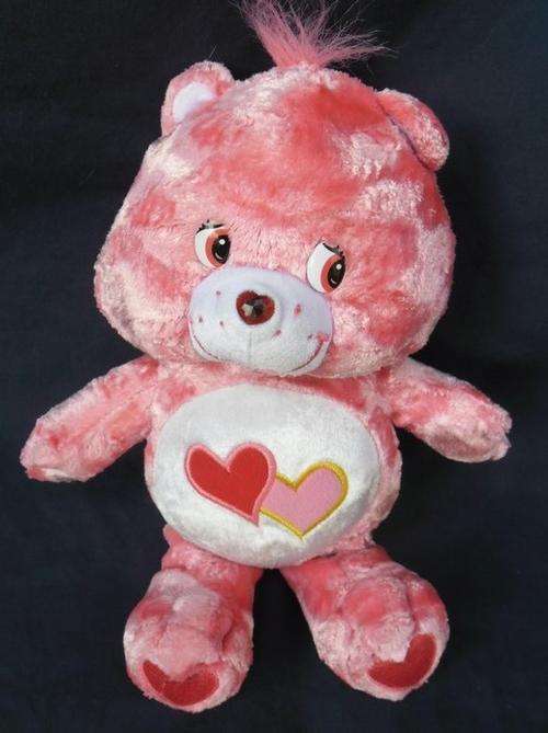 HOW CUTE IS THIS "LOVE-A-LOT" CAREBEAR WITH HIS LITTLE TAIL!